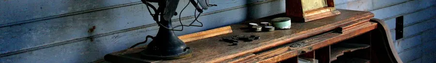 A worn workbench with hand tools, photographed by Tom Atkins